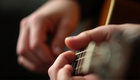 A instructor adjusting a student's hand